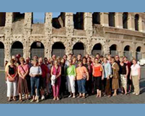 Large happy group of travelers in Italy. All hace secured the best Travel Medical care from Jfk Advanced Medical befor they left on their travels.